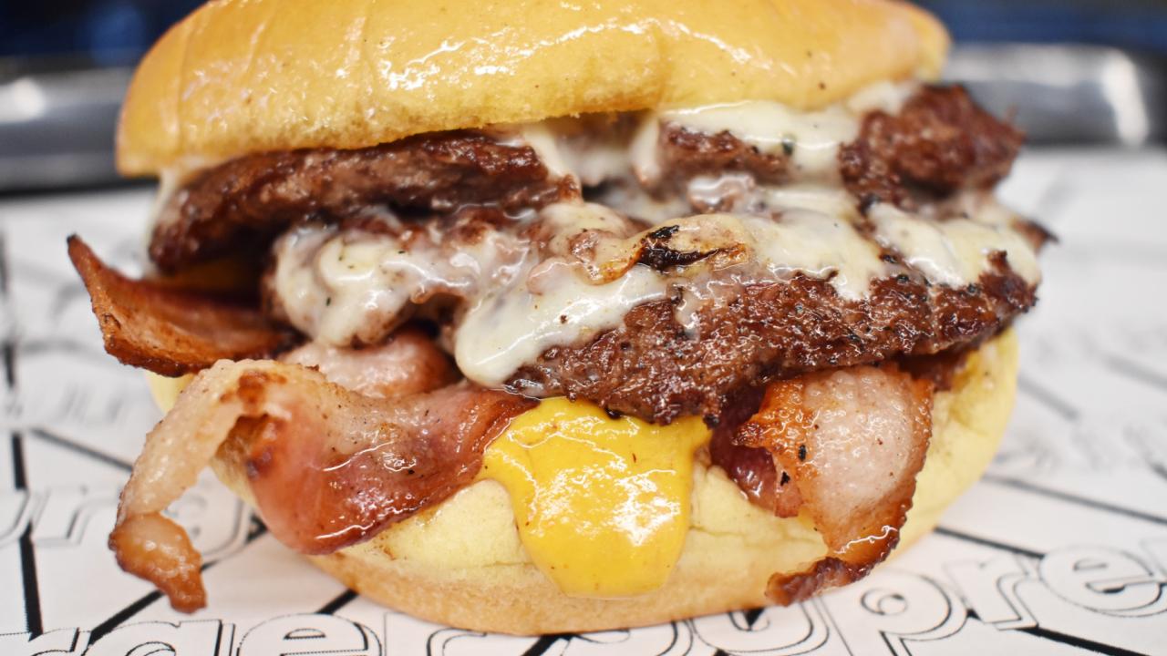 A greasy burger serves as an example of high-fat diet